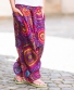 Dětské kalhoty Aladin – světle fialové s barevnými kruhy