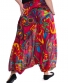 Kalhoty / šaty Aladin – červené s barevnými květy