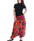Kalhoty / šaty Aladin – červené s barevnými květy