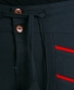 Kalhoty Pavlee – černé s červenou