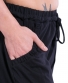 Kalhoty Phula – černé s tyrkysovou