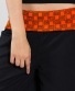 Kalhoty "Ornament" černé s oranžovou